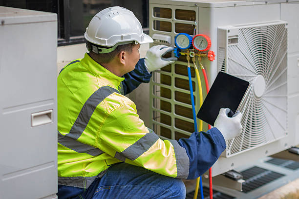 Professional Ductwork Repair technician working in Bedford, MA